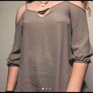 Gray open-shoulder blouse with gold strip